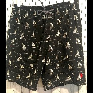 NWOT men’s swim trunks blk w/ white sailboats.